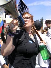 Devin Cohee leading chants at the May Day, 2006, immigrant rights march
