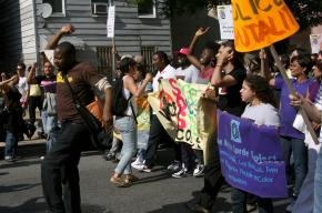 Supporters of two women beaten by New York City police officers march against police brutality