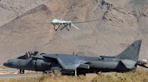 U.S. Predator drones (above) killed at least 150 people in Pakistan in the first 99 days of 2009