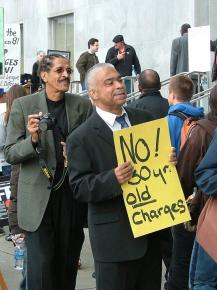 Ray Boudreaux (left) and Francisco Torres of the San Francisco 8 picket outside of the San Francisco courthouse