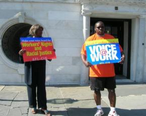 Fighting for justice for sanitation workers outside of a Charleston, S.C., City Council meeting