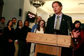 Whole Foods CEO John Mackey addresses a press conference about healthy eating