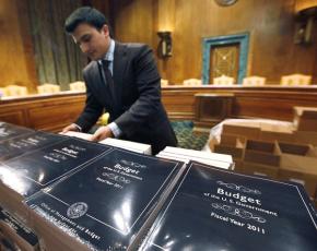 Copies of Obama's budget proposal stacked for distribution to senators