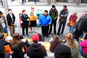 Rev. Israel Alvaran talks to activists before a protest at the nonunion Le Meridien hotel in San Francisco