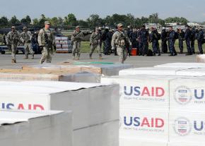 Relief aid piled up at the airport in Port-au-Prince, under the control of U.S. troops