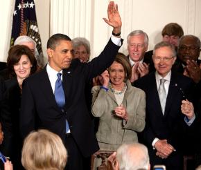 President Obama and leading Congressional Democrats at the White House signing ceremony for the health care bill
