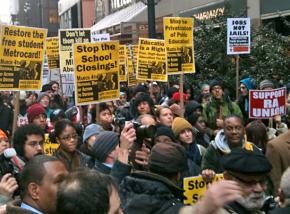 Protesters line up for a huge march against budget cuts in New York City