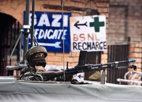 An Indian soldier on patrol in the Srinagar province of Kashmir