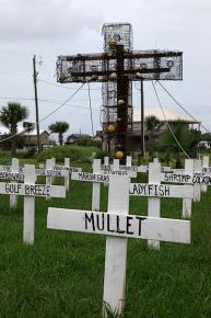 A makeshift cemetary set up in Grand Isle captures the toll of the BP oil disaster on the Gulf Coast