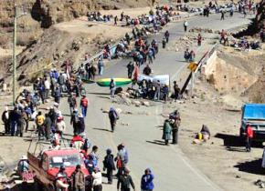 Protesters in Potosí gather near roadblocks built to help shut down the town