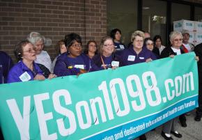 SEIU members deliver signatures in support of I-1098 to the Washington Secretary of State's office