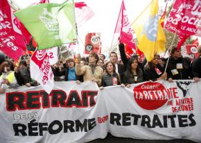 Workers and students march through Paris during a day of action against pension "reform" in mid-October