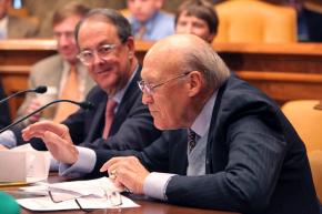 Alan Simpson and Erskine Bowles preside over a vote of commission members on their austerity proposals