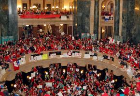 Workers and students filled the Wisconsin capitol building for another day of protest against Gov. Scott Walker's anti-labor bill