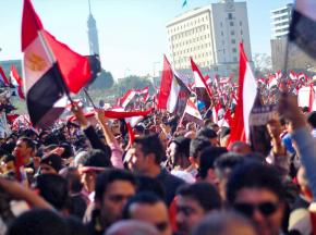 Egyptians celebrate the downfall of dictator Hosni Mubarak