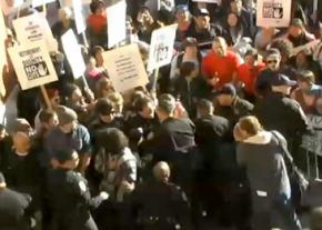 Police attack a crowd of protesters outside the UC Regents meeting in November 2010