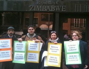 Picketers show their solidarity outside the Zimbabwean mission in New York City