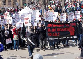 A contingent organized by the International Socialist Organization marching against union-busting in Madison