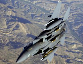 A U.S. F-15 fighter jet flies over Libya