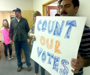 Members of UAW Local 2865 sat in to insist that every vote be counted