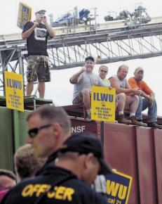 Members of ILWU Local 21 protest a scab longshore operation in Longview, Wash.