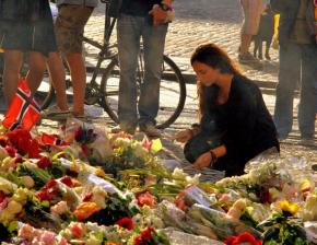A tribute of flowers and candles in Oslo to remember the victims of a right-wing terror attack