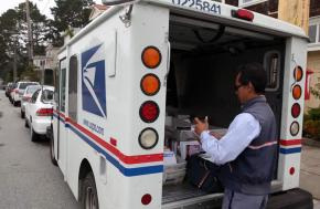 Some 120,000 postal workers could face layoffs if Congress approves pending legislation