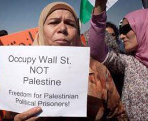 Palestinians march in solidarity with the occupation of Wall Street