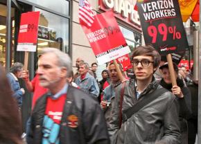 Occupy Wall Street marches in solidarity with Verizon workers