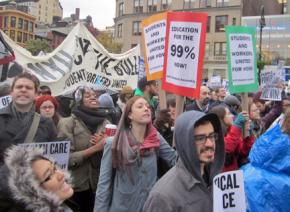 Students rallied at Union Square Park during the Occupy day of action before marching to Foley Square