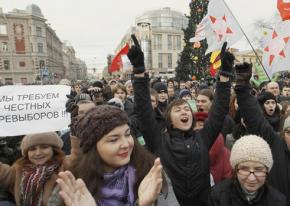 Protesters massed in Russian cities to protest election fraud and call on Putin to resign