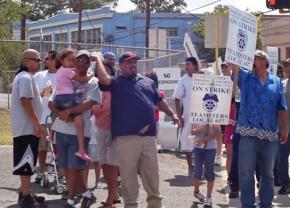 Teamsters and their supporters demonstrate for justice outside the C.H. Guenther &amp; Sons flour mill