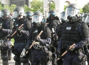 Police protect the 2008 Republican National Convention from protesters