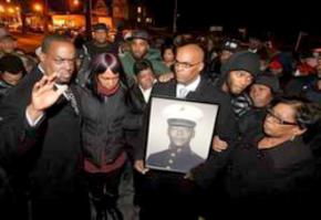 Family members and supporters protest the murder of Kenneth Chamberlain Sr.