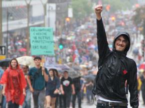 Québec students participate in a mass march in defiance of repressive laws