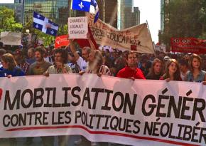 Protesters join in a massive march in Montreal on August 22