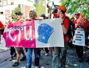 Madison teachers march in solidarity with striking Chicago teachers at a solidarity rally