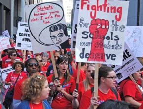Tens of thousands of striking teachers and their supporters pack the streets of downtown Chicago