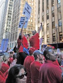 Tens of thousands of Chicago teachers and supporters rallied at the Board of Education building