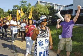 Striking workers at Westport Health Care Center on the march earlier this summer