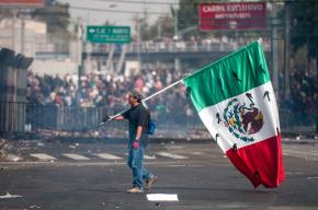 Mass protests greet the inauguration of Mexico's new President Enrique Peña Nieto
