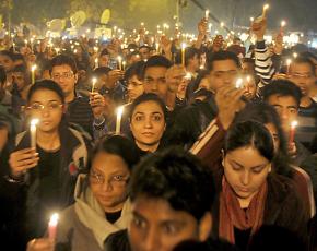 Protesters march in Delhi after the death of a 23-year-old victim of gang rape