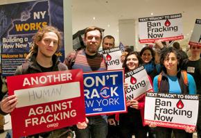 Anti-fracking protesters fill the lobby outside during Gov. Andrew Cuomo's State of the State speech