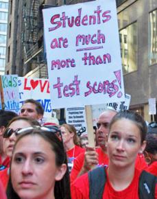 Striking Chicago teachers stand public schools being turned into testing factories