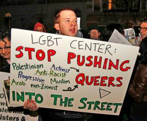 LGBT rights activists protest the center's former policy banning Palestine solidarity events