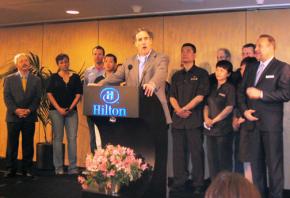 HERE Local 2 President Mike Casey talks about an agreement with Hilton, flanked by San Francisco Mayor Ed Lee (far left) and Hilton Union Square GM Michael Dunne