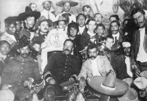 Pancho Villa (front row, second from left) poses with Emiliano Zapata (front row, third from left) in Mexico City
