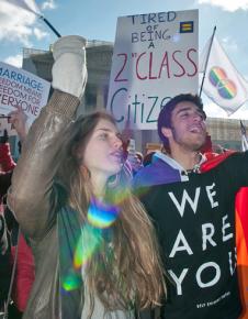 LGBT rights activists rally for marriage equality outside the Supreme Court