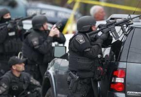 Police in Boston armed to the teeth during the manhunt following the Boston Marathon bombings
