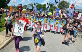 Protesters march near Fort Meade to demand justice for Bradley Manning